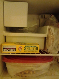 13"L x 7"W x 3"D Rubbermaid container fits perfectly in bottom of fridge! 